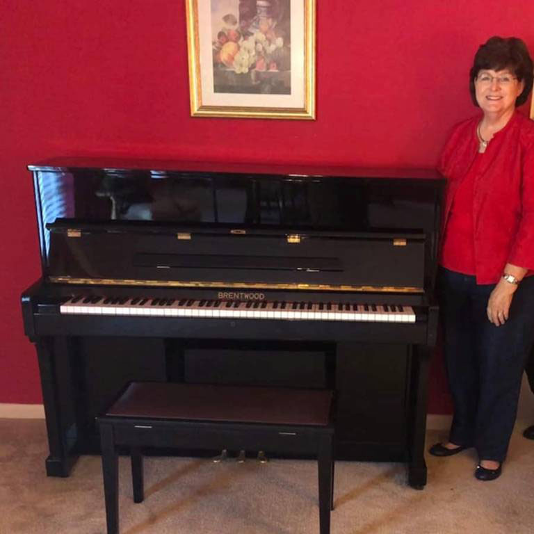 Mrs. Cecelia Gloss with piano